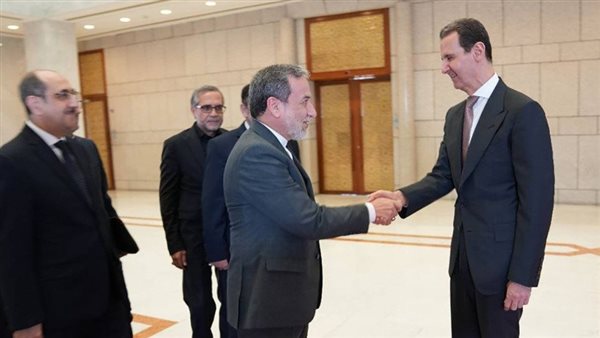 بشار الأسد ووزير خارجية إيران عباس عراقجي