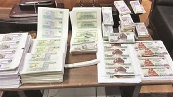 تزوير عملات- أرشيفية 
