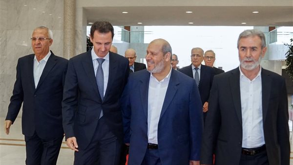 خليل الحية رئيس حركة حماس وبشار الأسد
