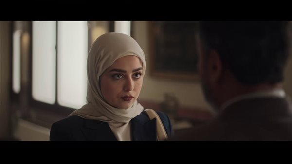 هبة مجدي بالحجاب على بوستر فيلم استنساخ عودة إلى السينما بعد