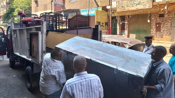 جانب من تنفيذ حي الوراق حملة رفع الإشغالات بشوارع الحي