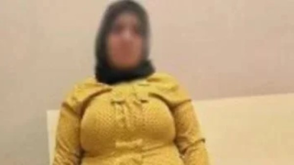 المتهمة بعد القبض عليها 