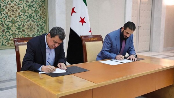 الرئيس السورى المؤقت أحمد الشرع وقائد قسد مظلوم عبدي 