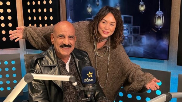 محمد لطفي والمذيعة إنجي علي
