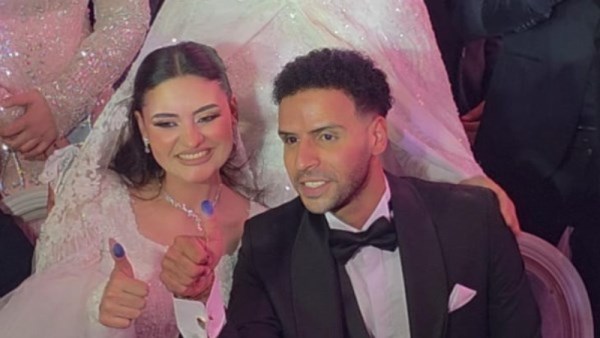 نجل محمد رضوان وزوجته 